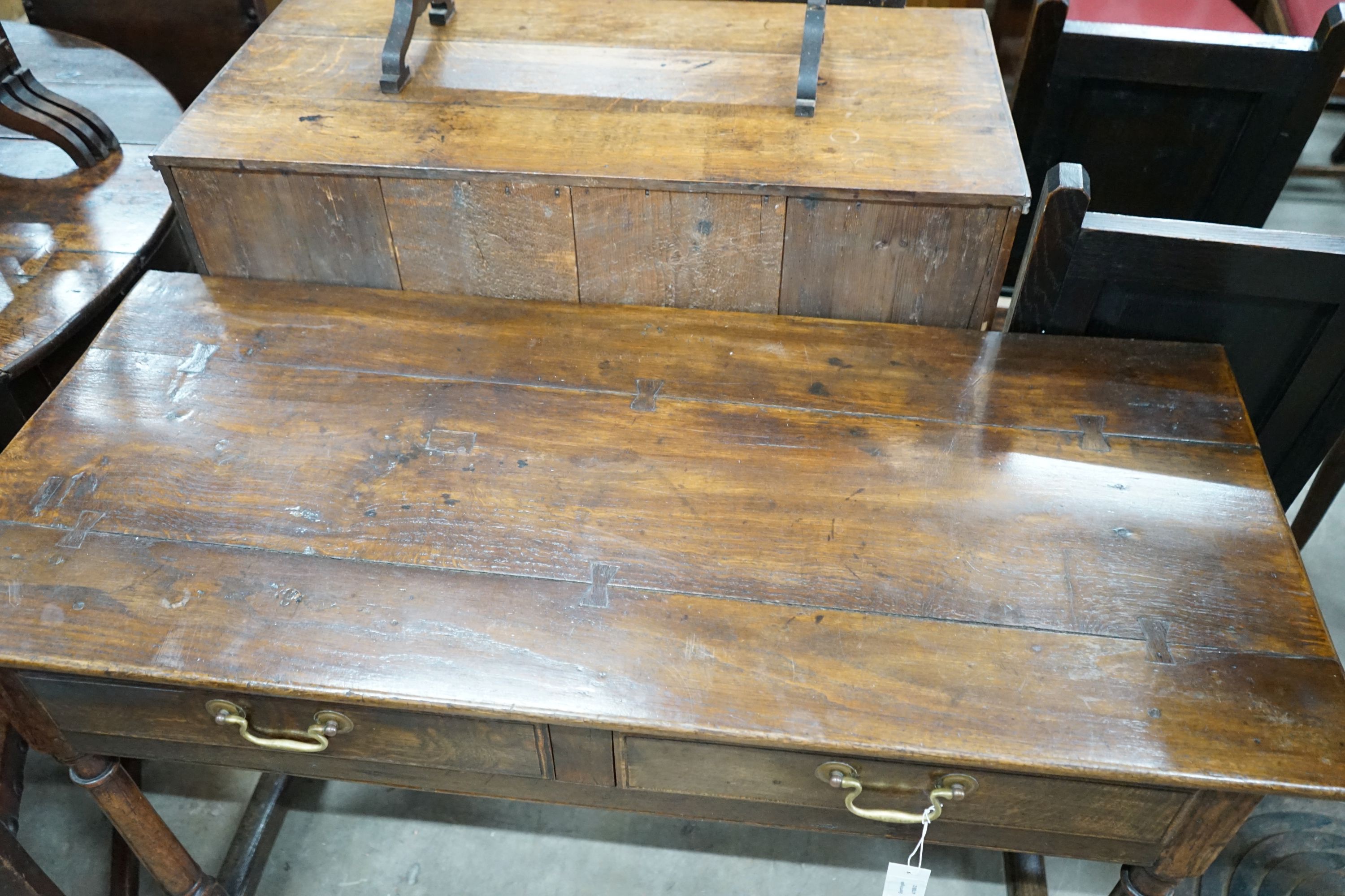 An 18th century style oak two drawer side table, width 120cm, depth 51cm, height 74cm